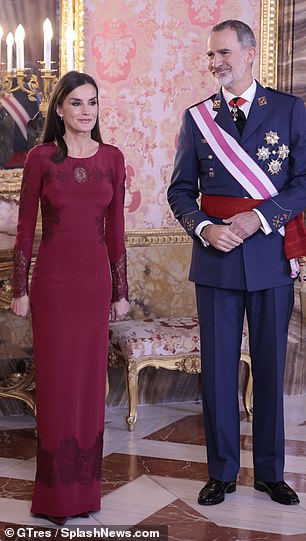 The Queen of Spain looked elegant in the body-hugging dress with a lace detail.