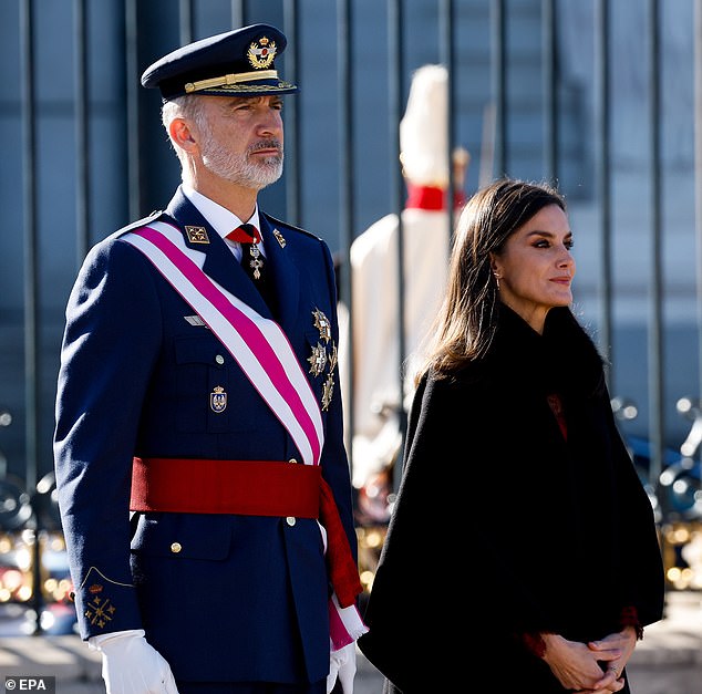 Felipe looked dapper in his military uniform and decorations, while Letizia donned a much-loved cape for the occasion.