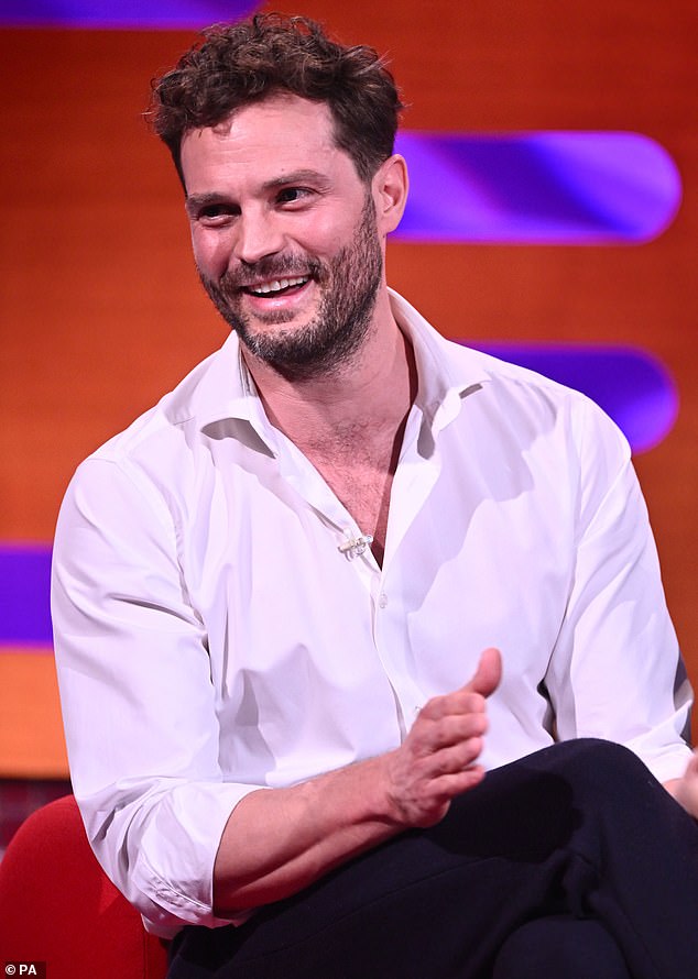 Feeling inferior: He once again sported facial hair in the role, following his appearance in 2017's Murder On the Orient Express and 2022's Death On The Nile, after co-star Jamie Dornan (pictured) described the waxed mustache and the beard like 