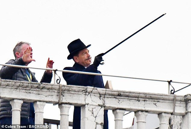 Filming: The Oscar winner could be seen filming scenes on the rooftop, above the Clock Tower in Piazza San Marco