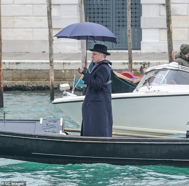 Double: His stand in then led to a gondola and filmed scenes