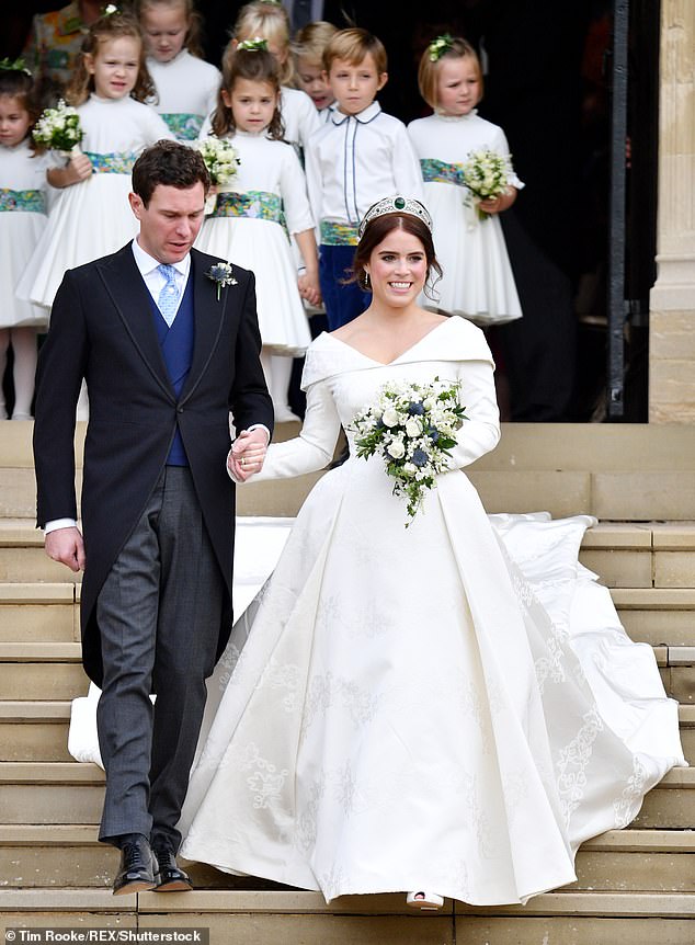 Princess Eugenie and Jack Brooksbank pictured on the steps of St George's Chapel after their wedding ceremony on October 12, 2018.