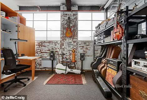 The former owner had been using one of the rooms as a music studio for the 14 years he lived in the house where he practiced singing and played his variety of instruments.