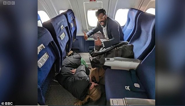 Funny: Alex then questioned Katherine about a photo showing her fast asleep on the floor of an airplane with co-star Romesh Ranganathan giving a thumbs up.