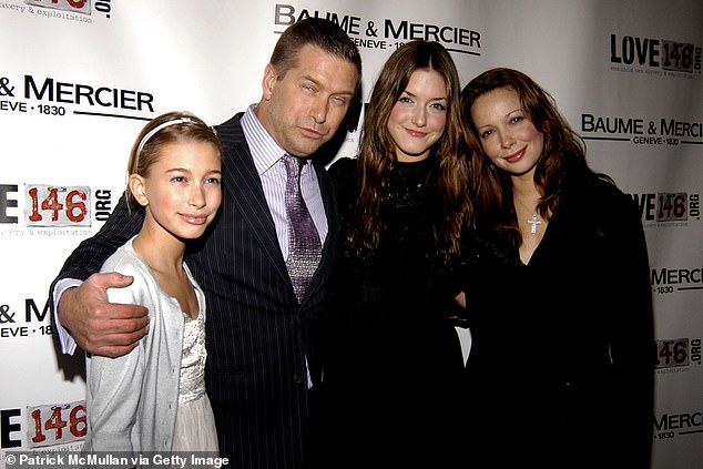 Family: Baldwin pictured with her father, sister Alaia Baldwin, and mother Kennya Baldwin in 2008