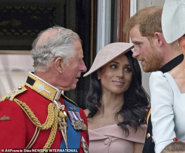 The Duke of Sussex claimed that his father said he was already concerned about the cost of helping William and Kate as Harry's relationship with Meghan blossomed, asking if the Suits actress wanted to continue in her profession (Pictured: the trio at Meghan's first Trooping The Color in 2018)