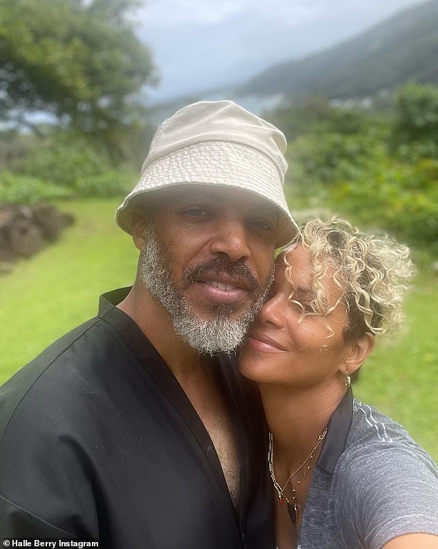 Happy together: Berry and Hunt, an acclaimed singer and multi-instrumentalist who specializes in soul, funk and rock music, have been romantically linked for more than two years.