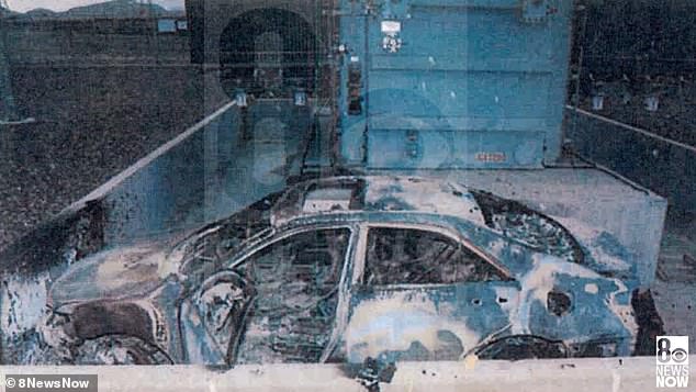 Pictured: The wreckage of the suspect's car at the power plant, where employees estimated it would take two years to repair the damage.