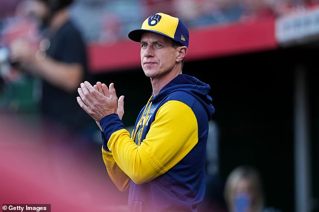 They took a T-shirt and shaving kit from manager Craig Counsell's office (pictured)