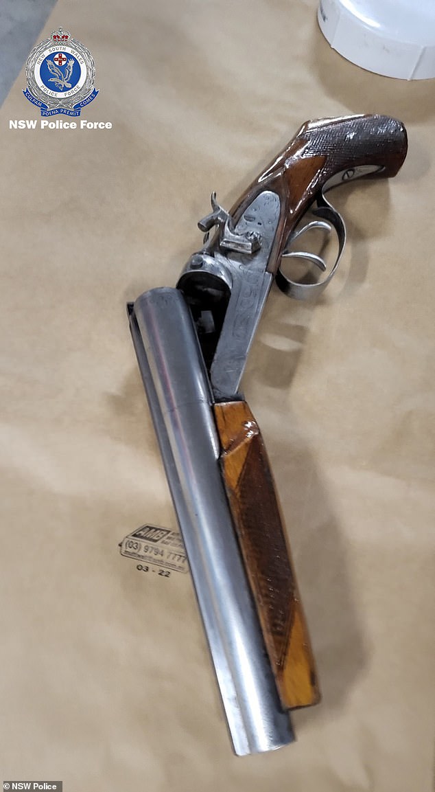 Police went to the unit around 7 pm on Thursday, December 5 and found a shotgun (pictured), ammunition, drug paraphernalia, and drug manufacturing precursors.