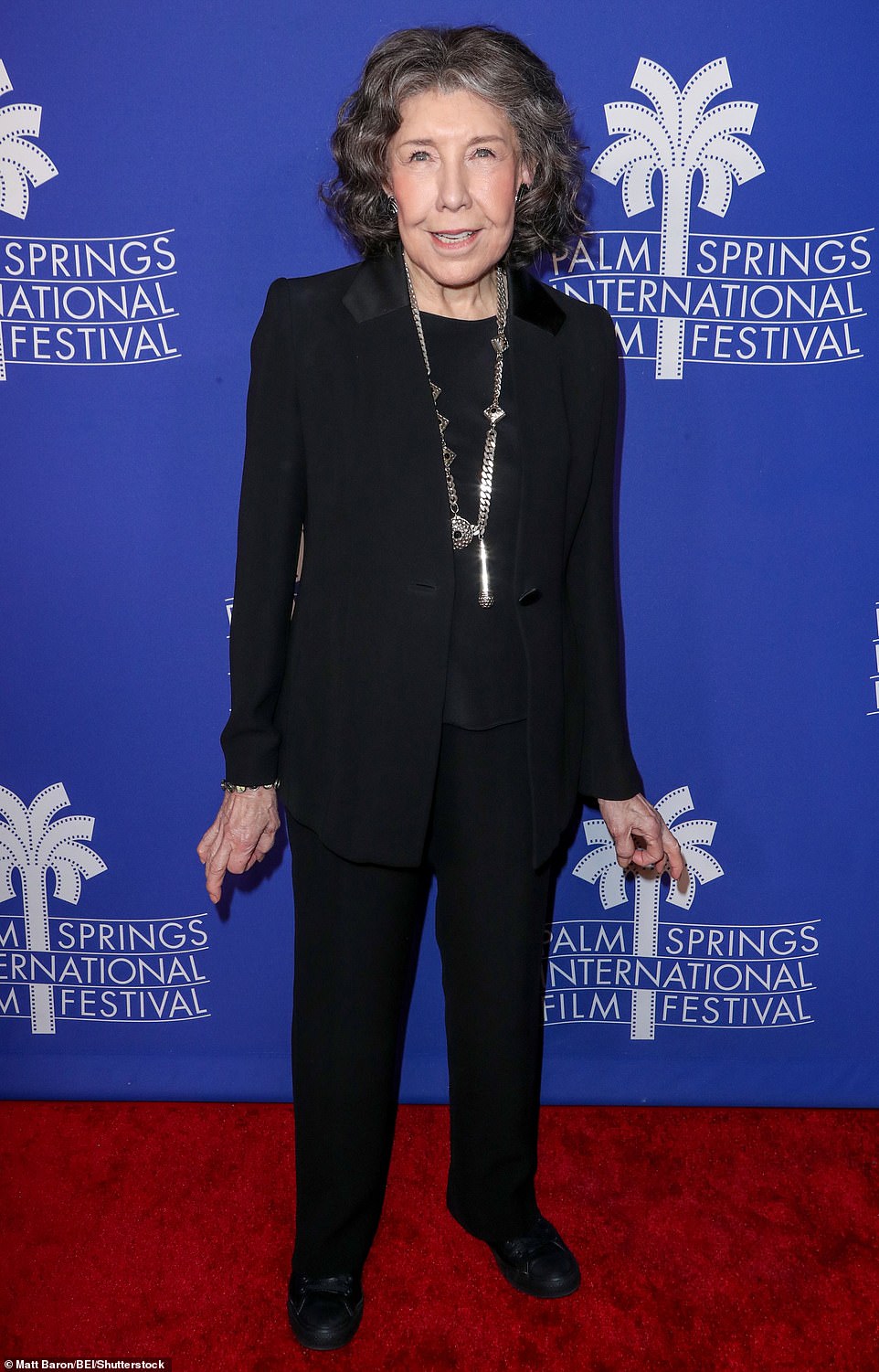 Golden Lily: Jane's Grace and Frankie co-star Lily Tomlin also opted for a black suit, but brought some glam on with a statement silver necklace