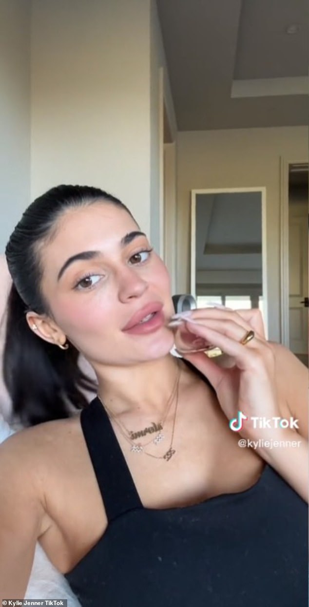 Sweet: The influencer rocked a necklace that spelled out her daughter Stormi's name, as well as a '222' necklace that appeared to be a nod to her son's February 2, 2022 birthday