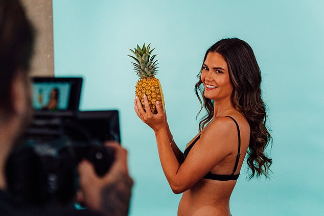 The beauty worked her angles as she rode him for the camera, holding a pineapple seductively.