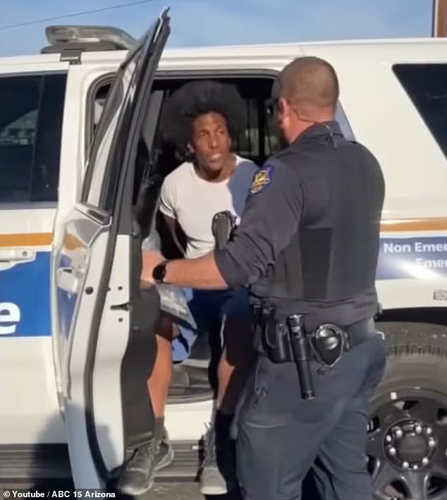 A police officer arrived at the scene and handcuffed him and the officer threatened to force him into a police vehicle if he did not comply.