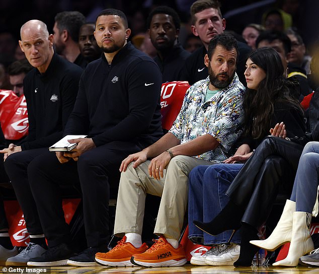 Game Coach: The comedian seemed to be giving his daughter a basketball lesson or two on occasion during the game.