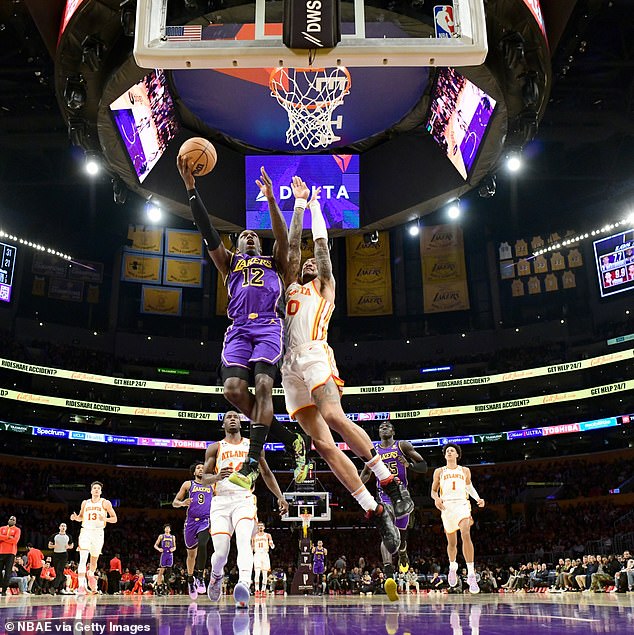 Winning streak: Along with King James' 25, Kendrick Nunn scored 23 points off the bench to help the Lakers dominate the Hawks 130-114 for their fourth straight win.