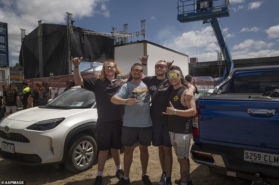 The crowd seemed to enjoy the spectacle of the mullet contest, although attention quickly returned to the track.