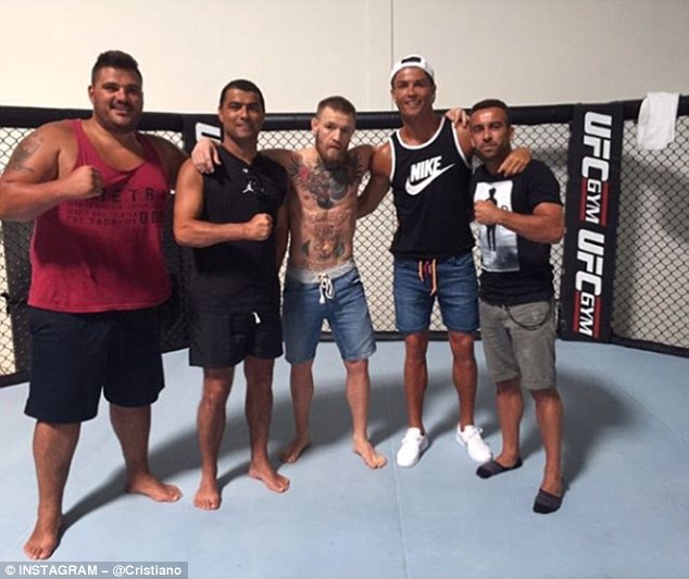 He was among Ronaldo's team when they visited Conor McGregor (centre) in Las Vegas.