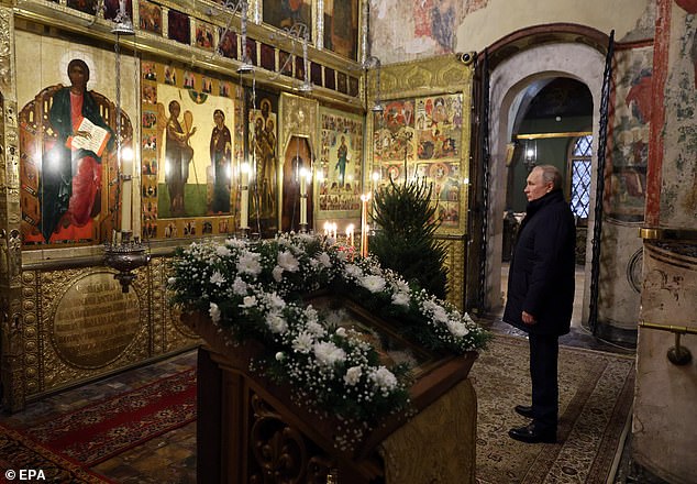 Putin is seen crossing himself and shuffling uneasily during a ceremony at a place of worship where tsars traditionally confessed their sins, the Cathedral of the Annunciation in the Kremlin in Moscow, Russia, on January 6, 2023.