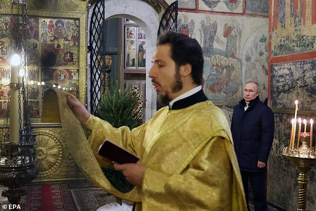 Vladimir Putin attends a Christmas service at the Annunciation Cathedral in the Kremlin in Moscow, Russia, on January 6, 2023.