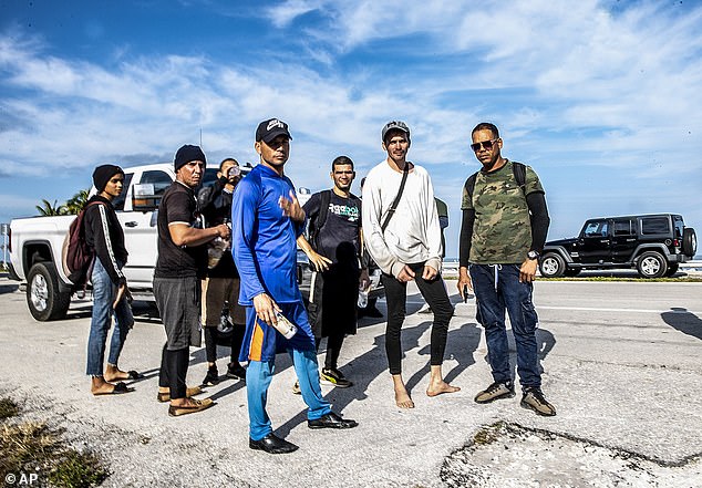 A group of Cuban migrants from the city of Matanzas were seen standing in the sun while standing in the middle of Duck Key, Florida