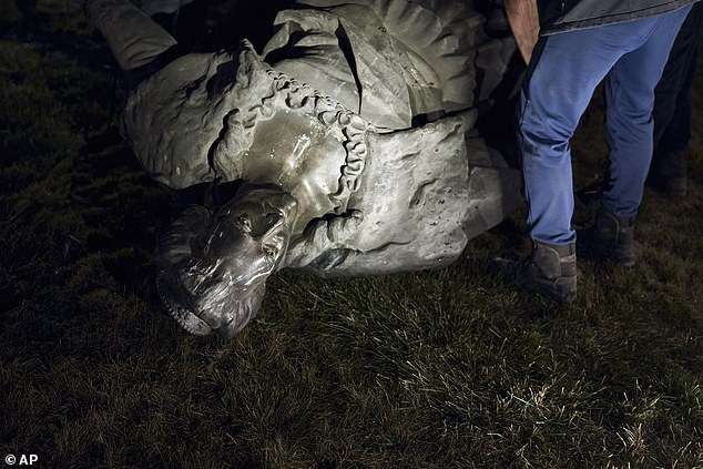 Workers remove the monument to Catherine II, also known as the 'Monument to the Founders of Odessa', Ukraine, in the early morning of December 29, 2022