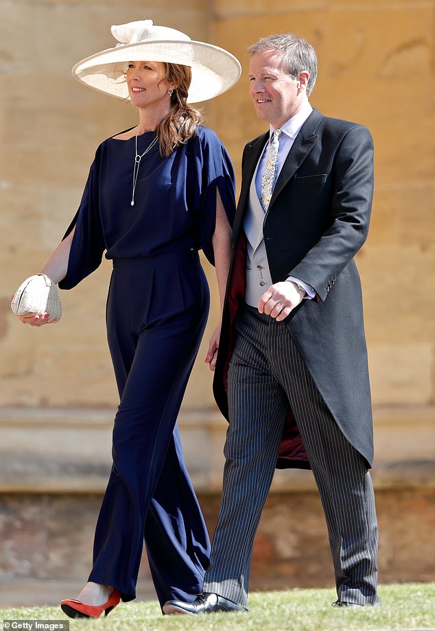 Tom Bradby (right) with his wife Claudia Bradby (left) at the wedding of the Duke and Duchess of Sussex in 2018