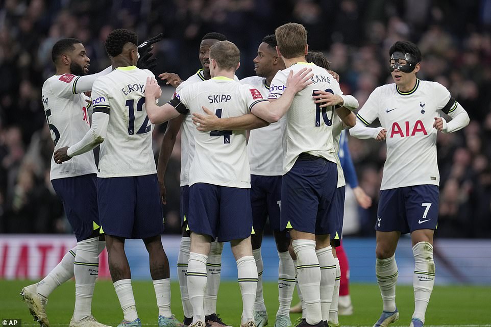 The Spurs players celebrate as Harry Kane opened the scoring with his marvelous effort which turned out to be the game winner.