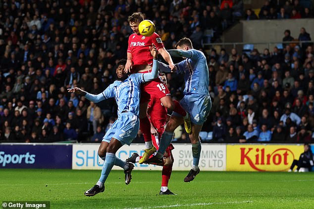 Sam Dalby opened the scoring for Wrexham when he rose higher to head in a cross.