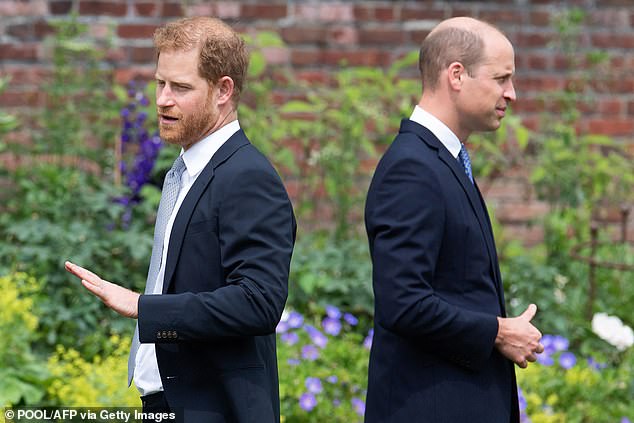 Britain's Prince Harry, Duke of Sussex (L) and Britain's Prince William, Duke of Cambridge attend the unveiling of a statue of their mother Princess Diana in The Sunken Garden at Kensington Palace, London, on July 1, 2021