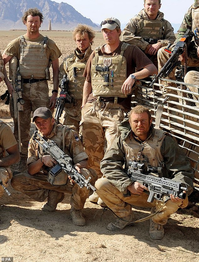 File photo dated 27/02/08 of Warrant Officer Nathan Hunt (front right) with Prince Harry (back centre), Dean Smith (back left) and other members of their battle group on deployment to Helmand province in southern Afghanistan.  Mr Hunt, who was mentioned in dispatches for his courage in locating roadside bombs while serving alongside Prince Harry in Afghanistan, has been found hanged after suffering years of nightmares and sleepless nights.