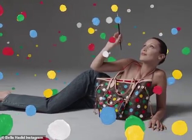 What a picture: A couple of eye-catching videos showed her surrounded by multicolored blobs of paint, all suspended in the air around her like bubbles.