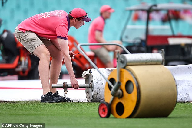 SCG maintenance staff went back to using a set of blank SCG covers on day four after the NRMA insurance advertising stamped set apparently caused an embarrassing leak in the wicket square