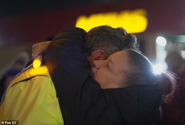 At a vigil on Friday night, supporters came up and hugged Elliott.