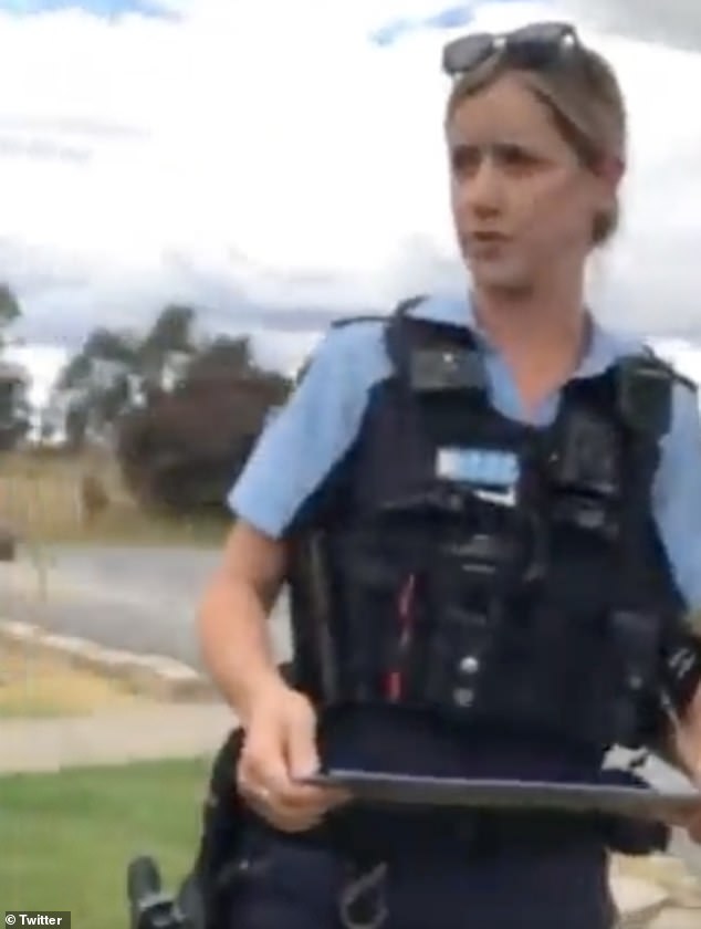 The police officer remains composed in the video as the driver continues his ramblings explaining that their license plates are kept in the car.