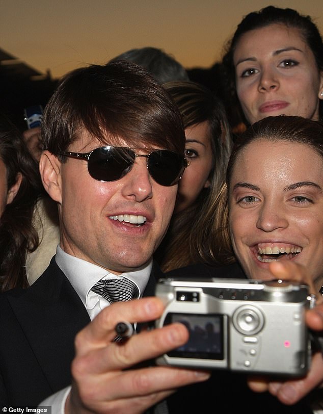 Tom Cruise took a photo with fans in 2007 outside the Rome Film Festival.