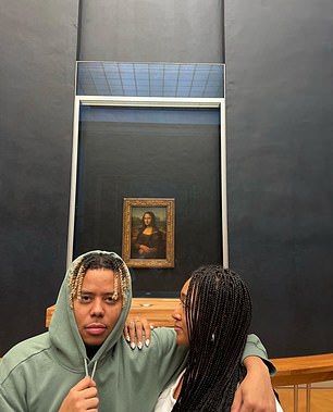 Mona Lisa was in the background while they visited Paris