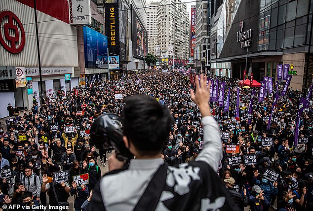 Wang said his spy job was to undermine the Hong Kong democracy protests, seen here in 2020.