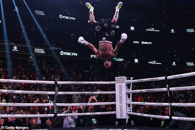 Davis celebrated his victory by climbing the ropes and doing backflips across the canvas.