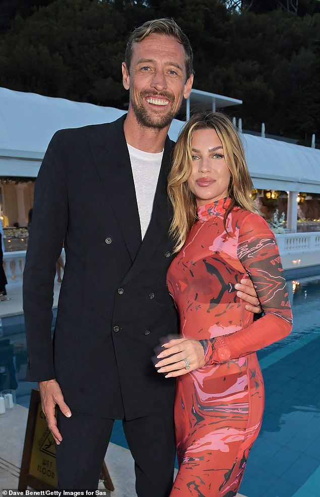 Footy: Just back home from a Christmas break in the Maldives, where she and her ex-footballer husband Peter Crouch renewed their wedding vows, the couple decided to enjoy a leisurely lunch.