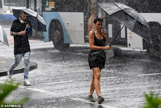 Queenslanders will need their umbrellas this week as wild weather moves east