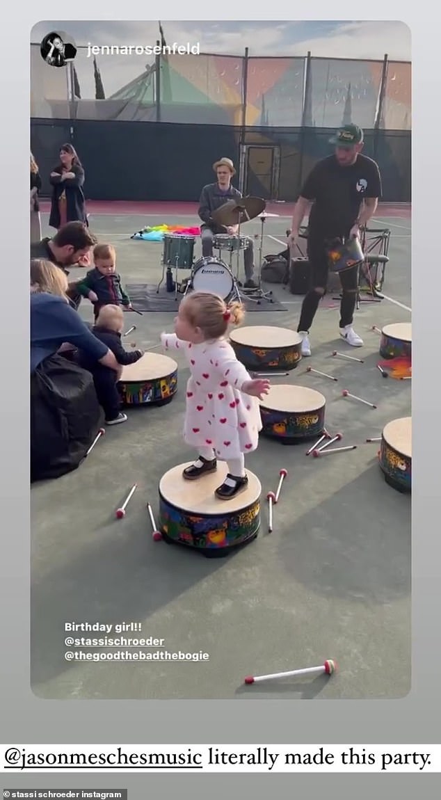 Jumping to the beat of her own drum: The birthday girl showed her love of music during a drumming competition with other kids and parents