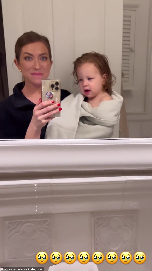 Quality time: Mom later documented Hartford's bath time with a mirror selfie