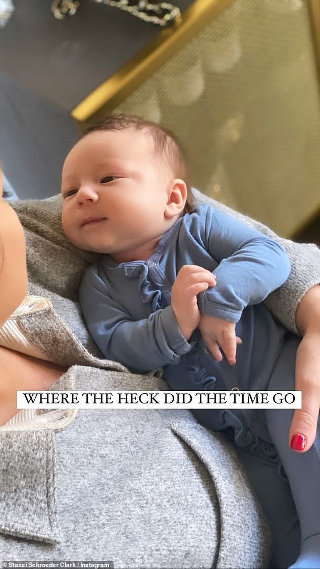 Time flies: Schroeder would recall sharing a photo of herself cradling her daughter when she was just a few months old, writing, 'where the hell did time go?'