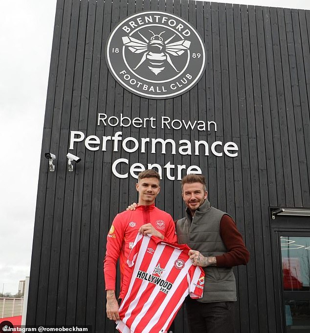 Romeo posed in his T-shirt outside the performance center with his famous dad David