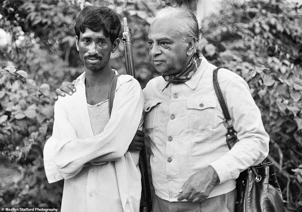 Mulk Raj Anand with a village victim of the Bangladesh Liberation War, Gopalganj district, 1972