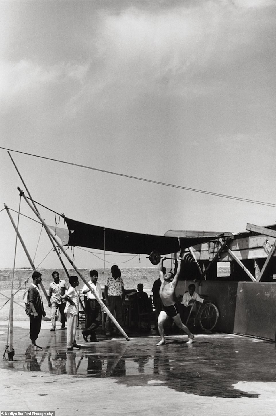 Marilyn Stafford captured a photo of a weightlifter working out in Sidon, Lebanon in 1960.