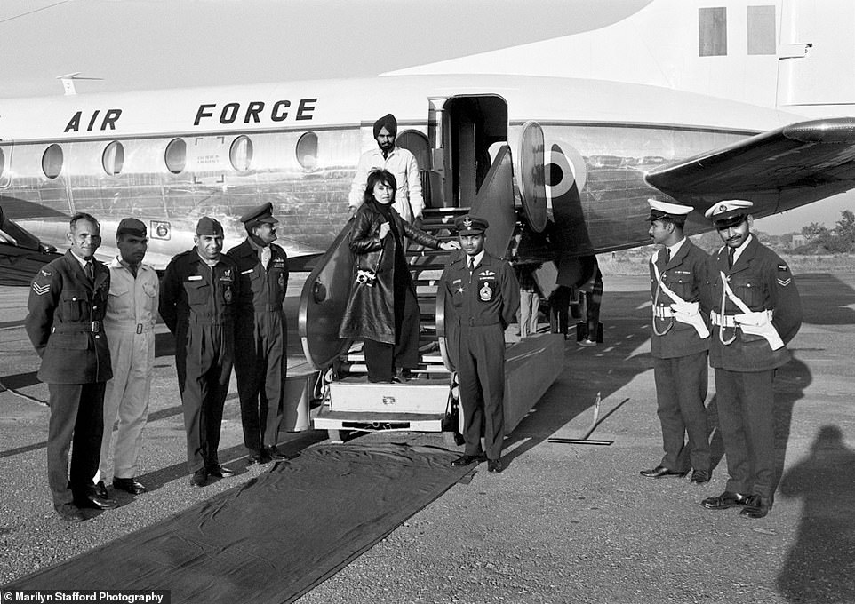 Marilyn Stafford boarding an Indian Air Force flight to Kashmir with Indira Gandhi.  unknown photographer