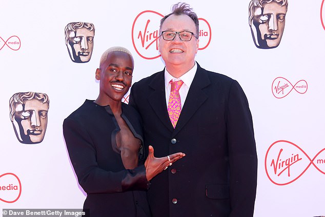 All is well: Russell, who cast Ncuti Gatwa (pictured together) as the 15th Doctor, explained in Doctor Who magazine that American producers give notes 