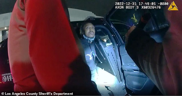 Newly released body cam footage shows the shocking moment a sheriff's deputy threatened to shoot an unarmed man as he sat in his car in South Los Angeles.